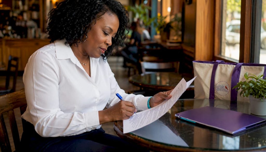 Woman reviewing commercial cleaning contract