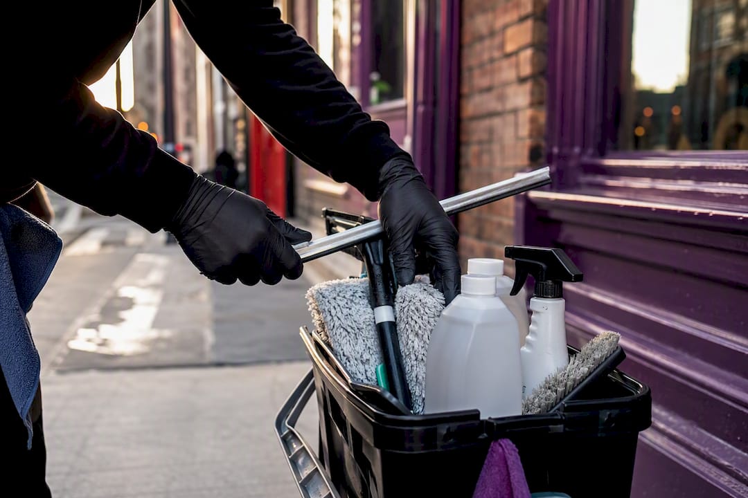 Window cleaning equipment set up hands close-up