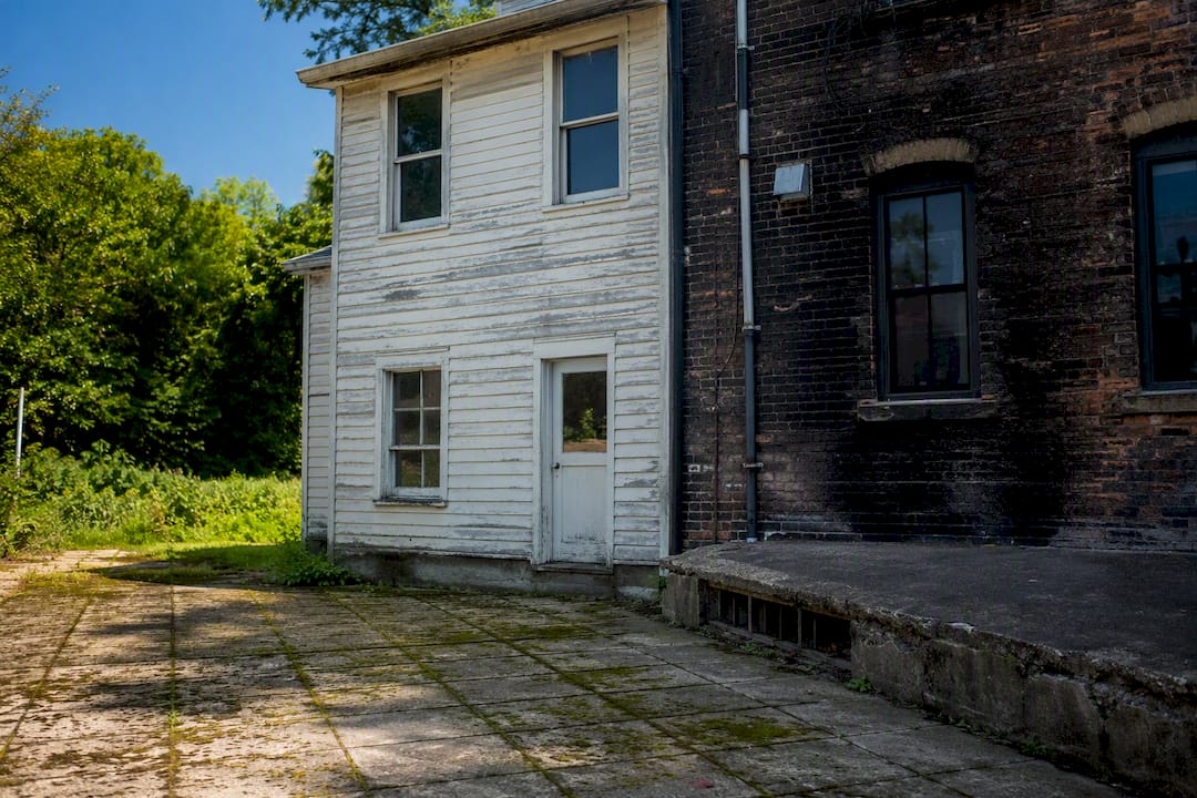Varied exterior surfaces with grime showing cleaning challenges