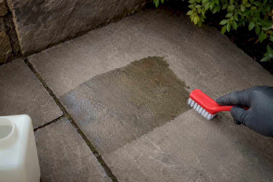 Cleaner test patch on patio stone