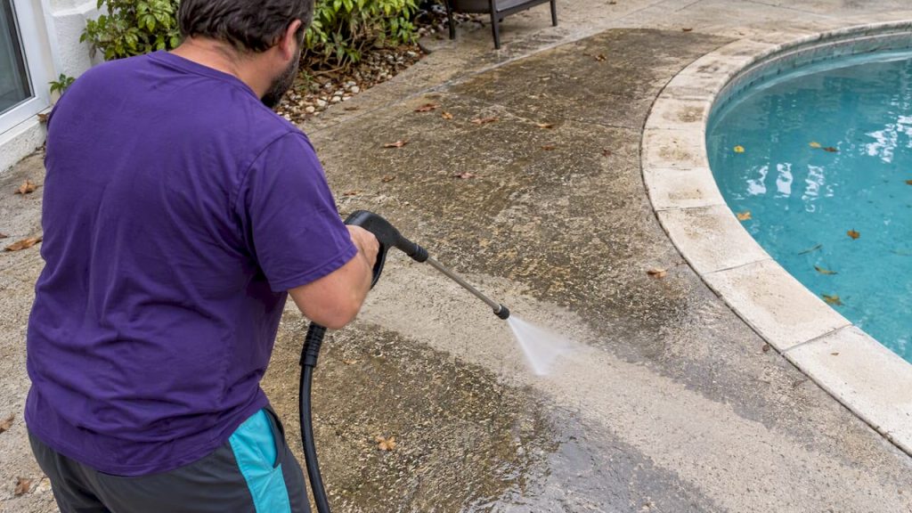 Pressure washing a textured pool deck
